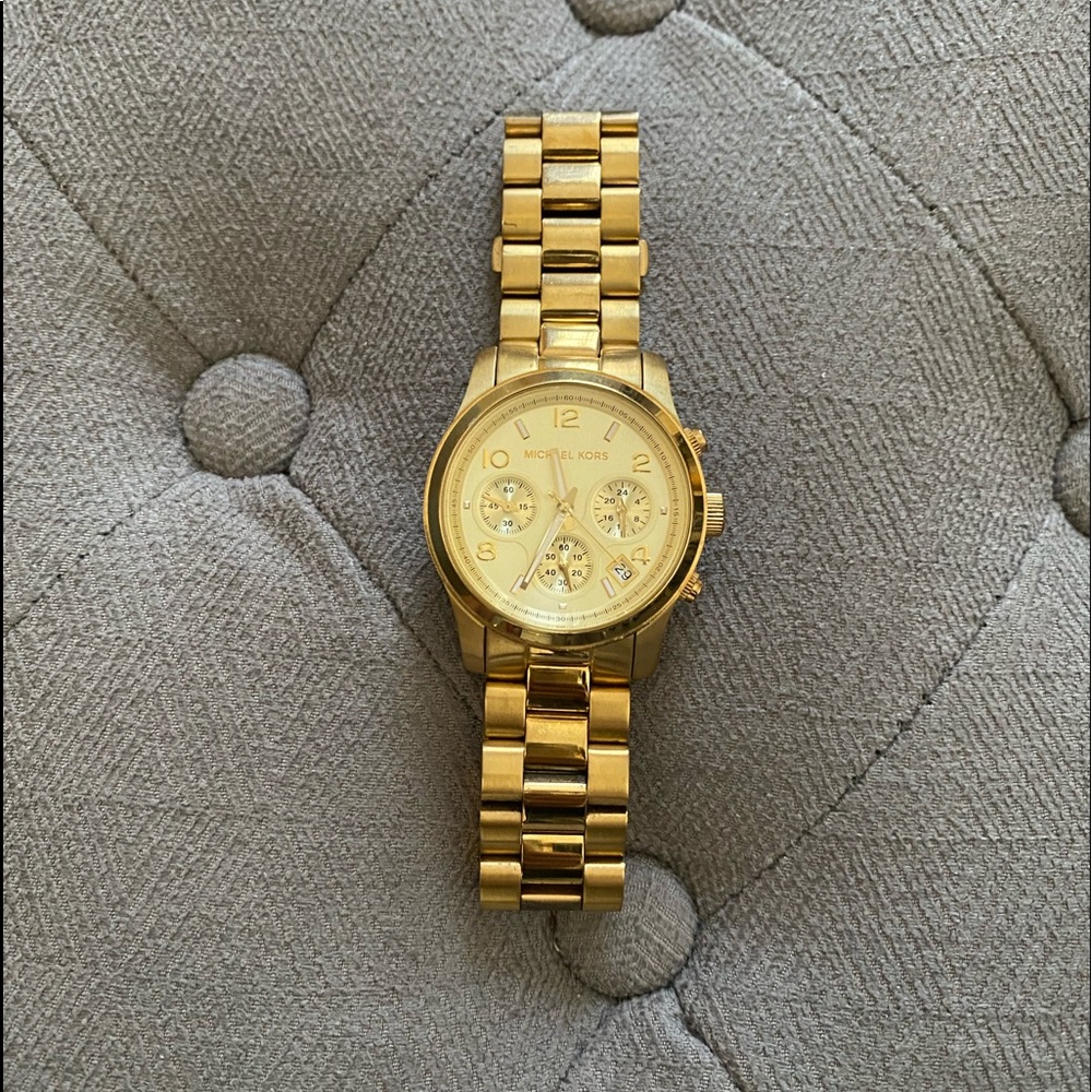 MK gold watch